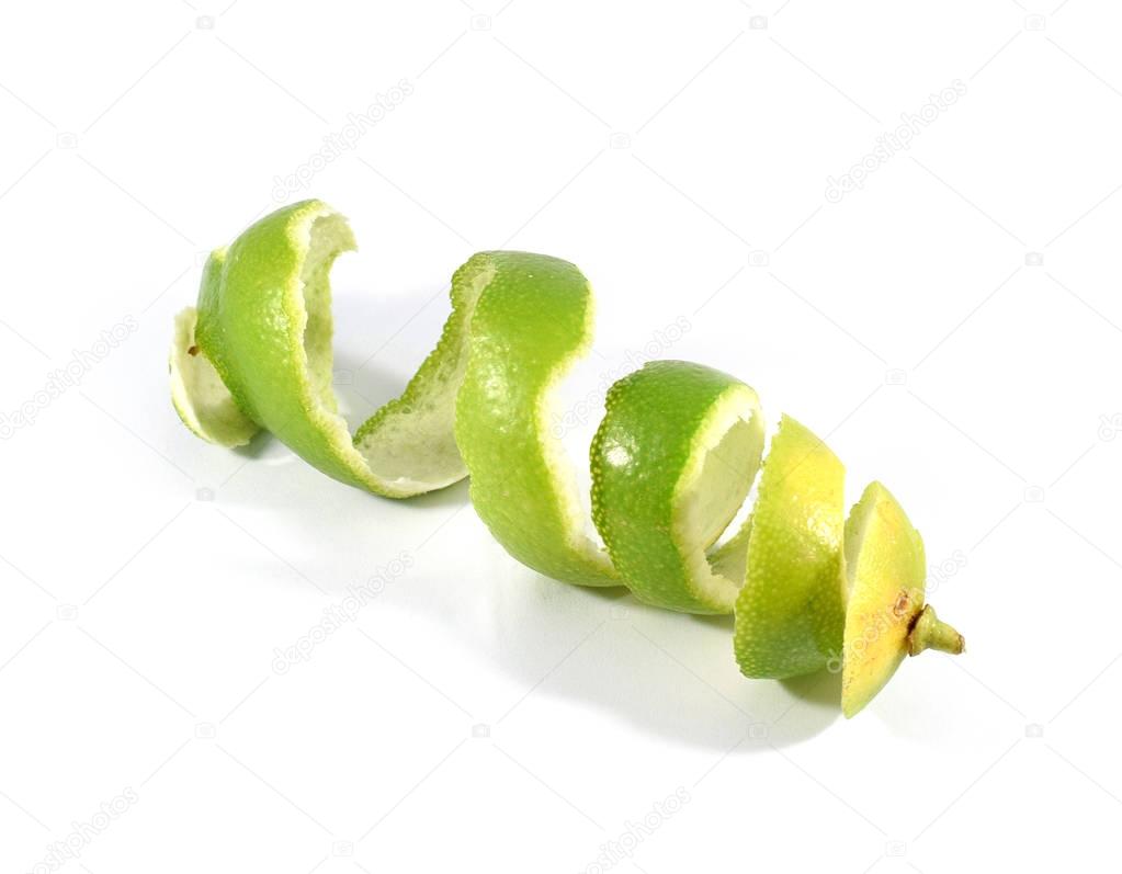 Curly lime peel twist isolated