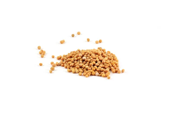 Pile of raw yellow mustard seeds — Stock Photo, Image