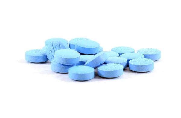 Stapel licht blauwe pillen — Stockfoto