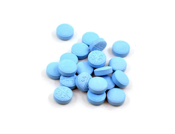 Stapel licht blauwe pillen — Stockfoto