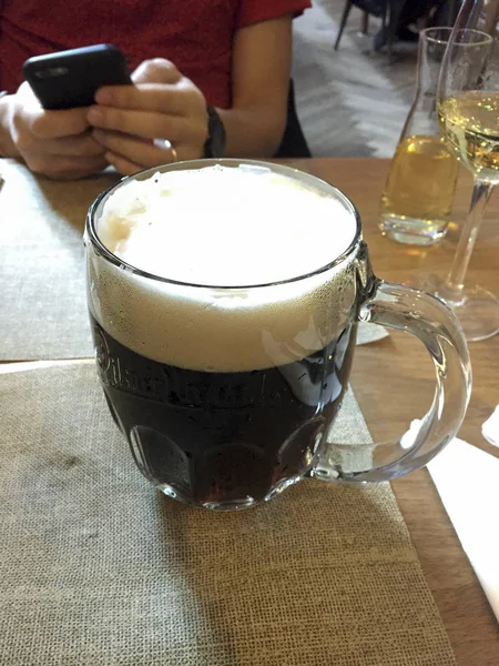Czech dark beer stein on a table