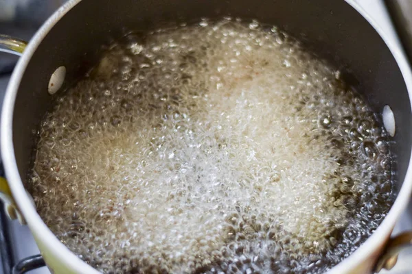 Food deep frying in vegetable oil — Stock Photo, Image