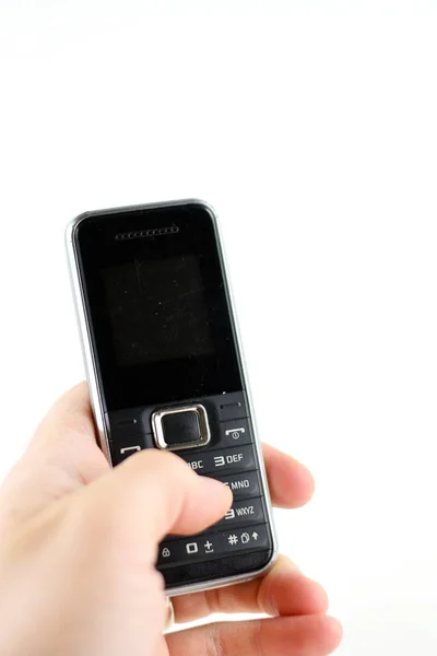 Thumb dialing on phone — Stock Photo, Image