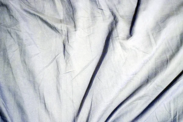 Azul cinza enrugado pano de algodão fundo — Fotografia de Stock