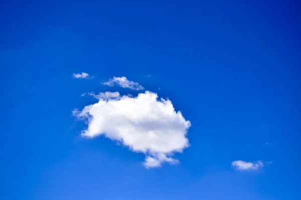Single cloud in blue sky