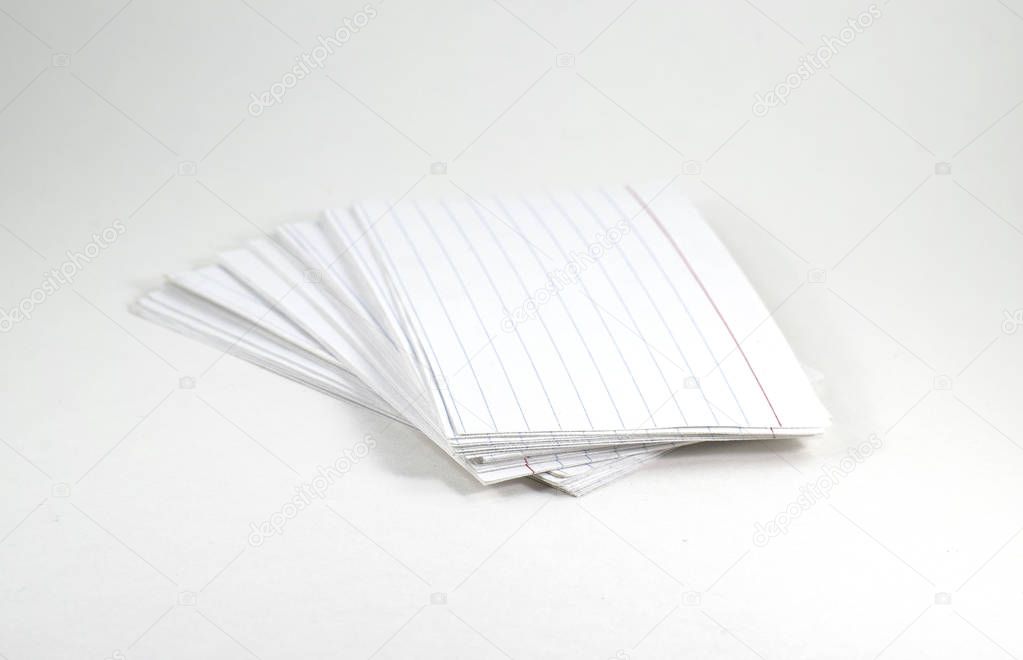 Pile of white lined index cards - isolated