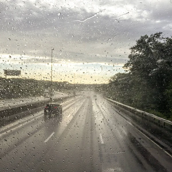 Rain Water Droplets Car Window Driving Highway Blur — Stock Photo, Image