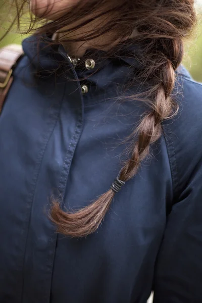 Woman with hair plaited in a braid — Stock Photo, Image