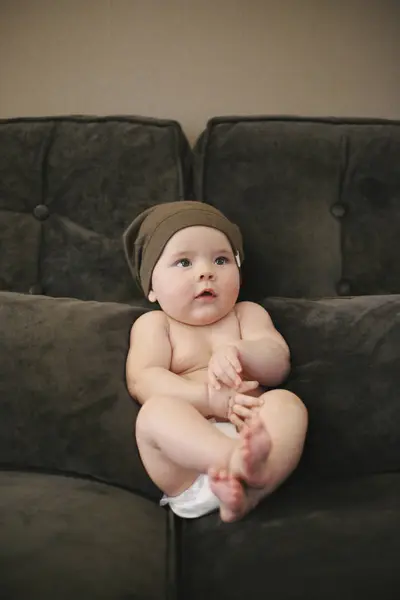 Baby Sitting Sofa Diaper Knit Hat — Stock Photo, Image