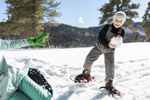 Six Year Old Boy Snow Shoes Holding Large Snowball — Stock Photo, Image