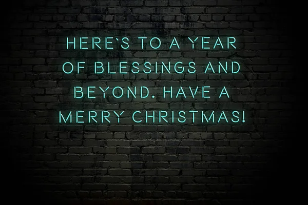 Neon inscription of christmas and new year greetings on brick wall — Stock Photo, Image