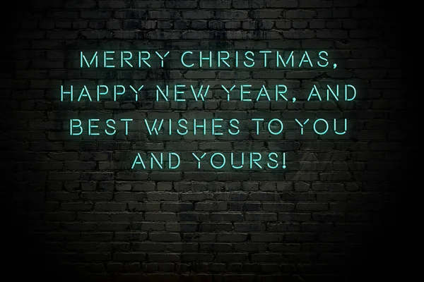 Neon inscription of christmas and new year greetings on brick wall — Stock Photo, Image