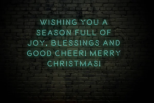 Neon inscription of christmas and new year greetings on brick wall — Stock Photo, Image