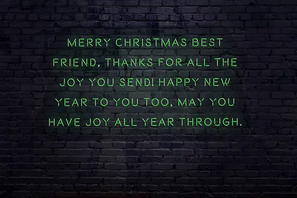 Neon inscription of christmas and new year greetings on brick wall — ストック写真