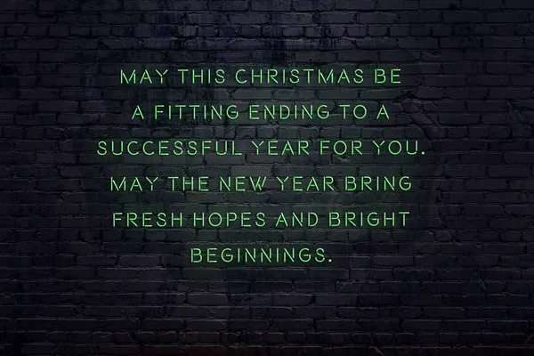 Neon inscription of christmas and new year greetings on brick wall — ストック写真