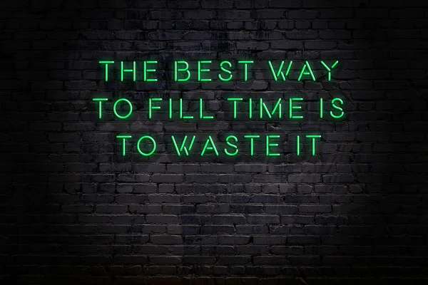 Smart and motivational quotation. Neon sign on brick wall — Stock Photo, Image