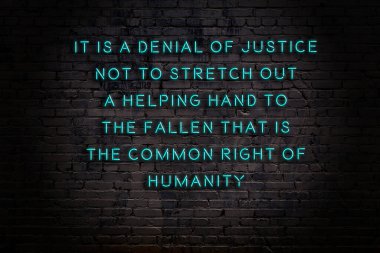 Zekice ve motive edici bir alıntı. Tuğla duvarda neon işareti