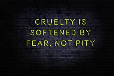 Zekice ve motive edici bir alıntı. Tuğla duvarda neon işareti