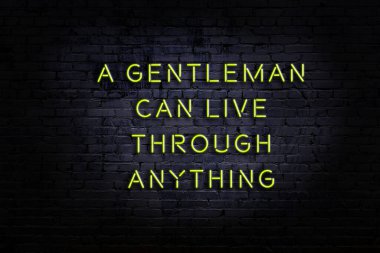 Zekice ve motive edici bir alıntı. Tuğla duvarda neon işareti