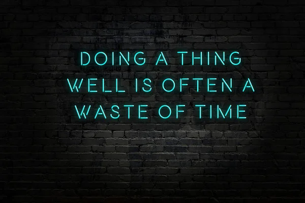 Smart and motivational quotation. Neon sign on brick wall — Stock Photo, Image