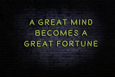 Akıllıca alıntı. Duvara karşı neon yazıtlar