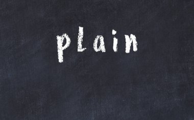 Üzerinde yazı olan siyah karatahta