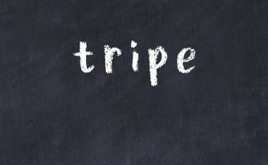 Üzerinde işkembe yazan tebeşir masası.