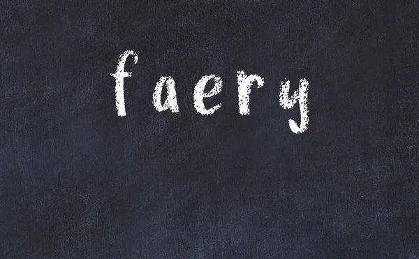 Faculdade mesa de giz com a palavra faery escrito em — Fotografia de Stock