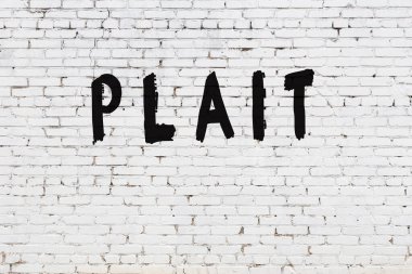 Üzerinde siyah boya örgüsü olan beyaz duvar.