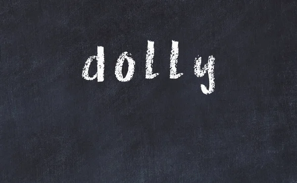 Mesa de giz da faculdade com a palavra dolly escrito em — Fotografia de Stock