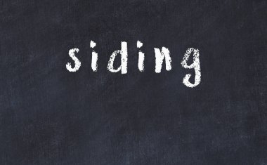 Üzerinde yazı olan siyah karatahta