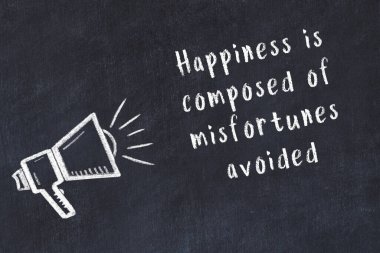 Siyah masaya hoparlör ve motivasyonel alıntının tebeşir çizimi