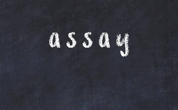 College chalk desk with the word assay written on in — Stock Photo, Image