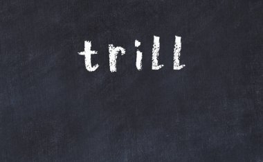 Üzerinde yazı olan siyah karatahta