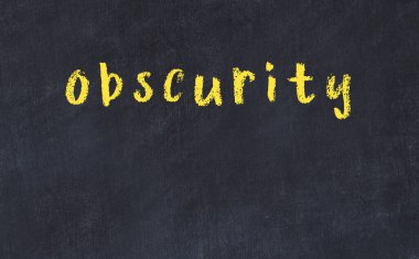 Üzerinde yazı olan siyah karatahta.