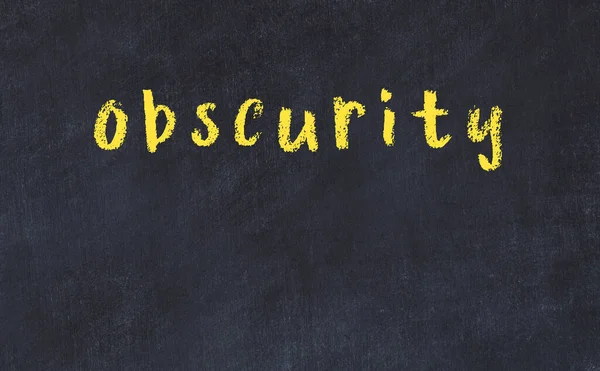 Üzerinde yazı olan siyah karatahta.