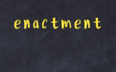 Üzerinde yazı olan siyah karatahta