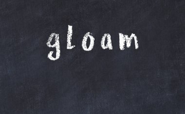 Üzerinde yazı olan siyah karatahta.