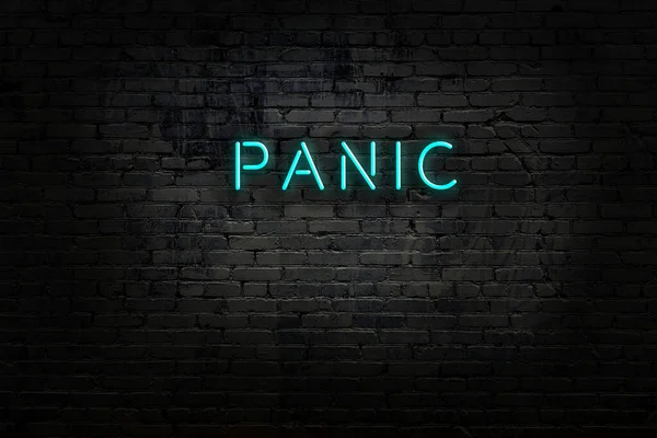 Neon jel felirattal pánik ellen téglafal — Stock Fotó