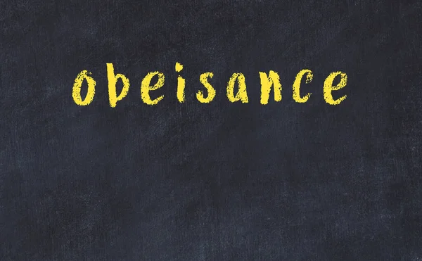 Üzerinde yazı olan siyah karatahta.