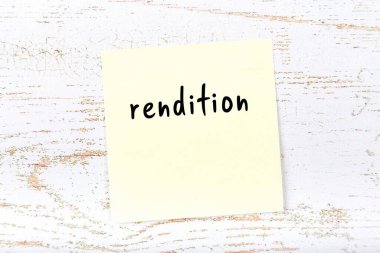 Tahta duvarda el yazısıyla yazılmış sarı yapışkan bir not var.