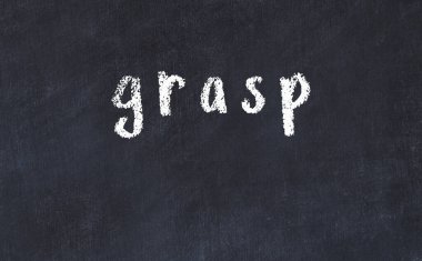 Üzerinde yazı olan siyah karatahta.