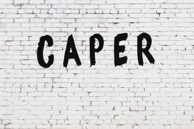 Beyaz tuğla duvara kelime hırsızlığı.