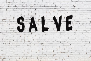 Sözcük merhemi beyaz tuğla duvara boyanmış