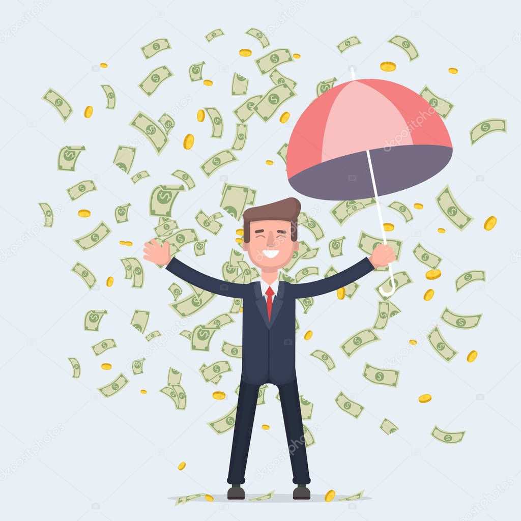 Businessman dances under money rain