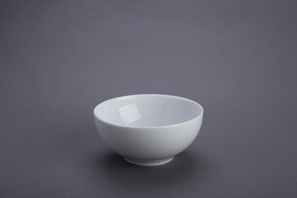 White bowl, gray scene