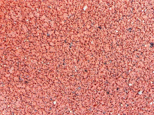 Червона гумова бігова доріжка — стокове фото
