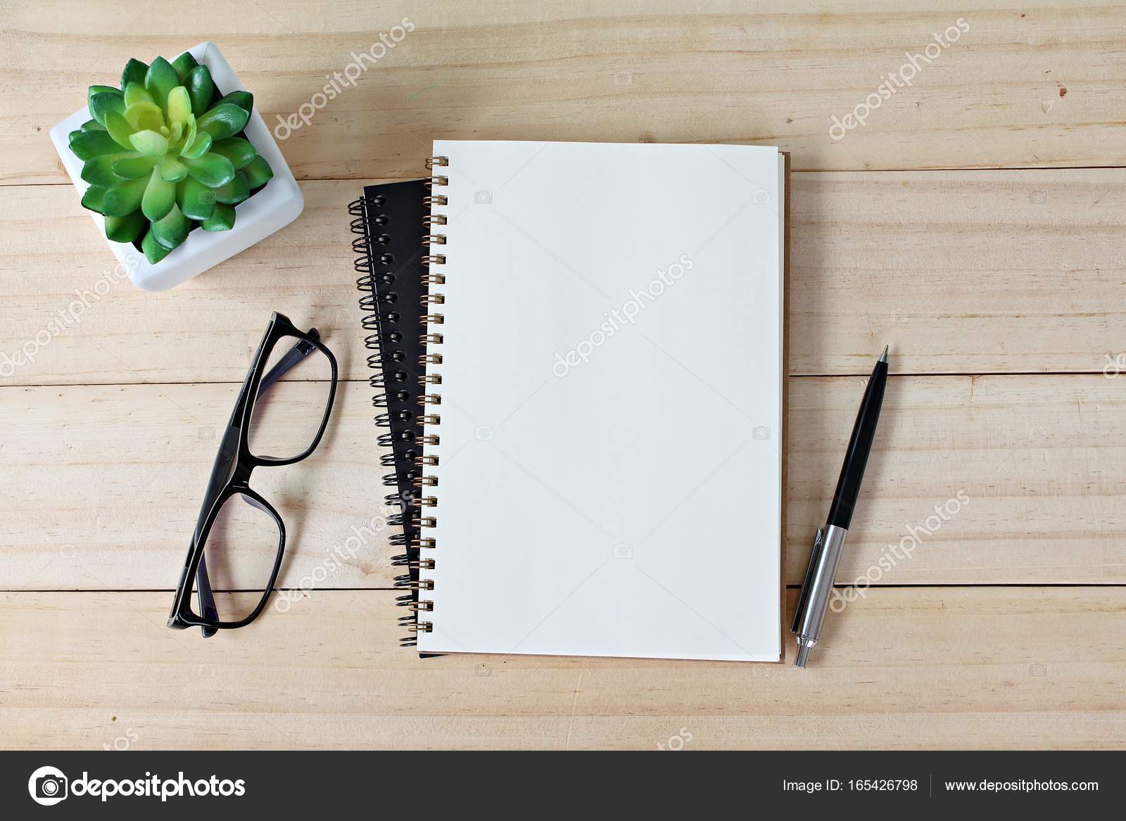 Office desk table with open notebook paper, pen and eyeglasses, Flat ...
