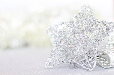 Parlak arka plan bokeh parlak Gümüş Yıldız süsler