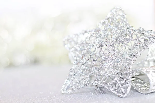 Parlak arka plan bokeh parlak Gümüş Yıldız süsler